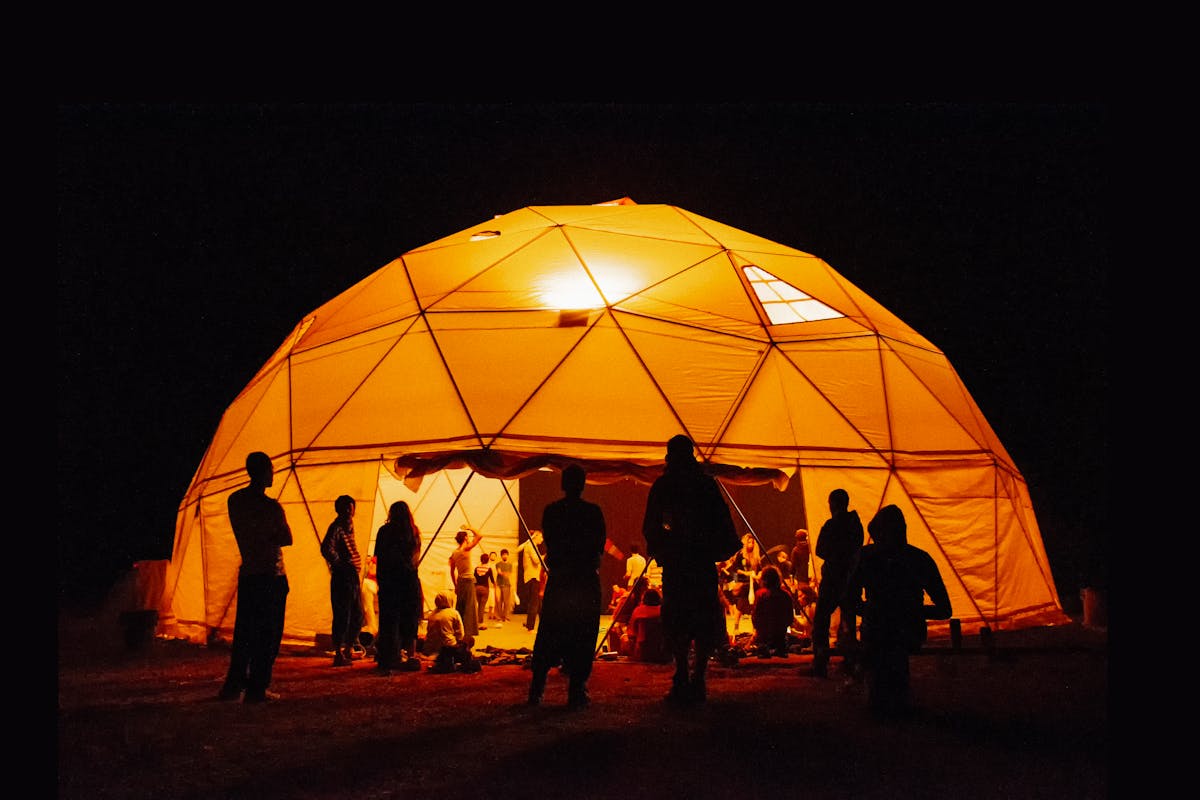 The Mainstage Dome — mid-size illuminated event dome at night